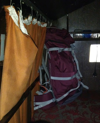 My packed backpack in a bus to Pushkar