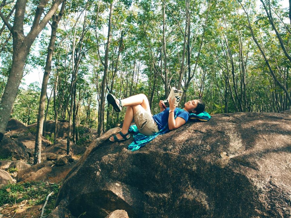 My picture while reading a book on a rock in a forest somewhere in Kanyakumari